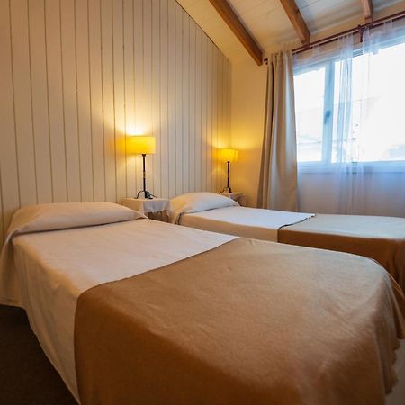 Los Calafates Hotel Ushuaia Bagian luar foto