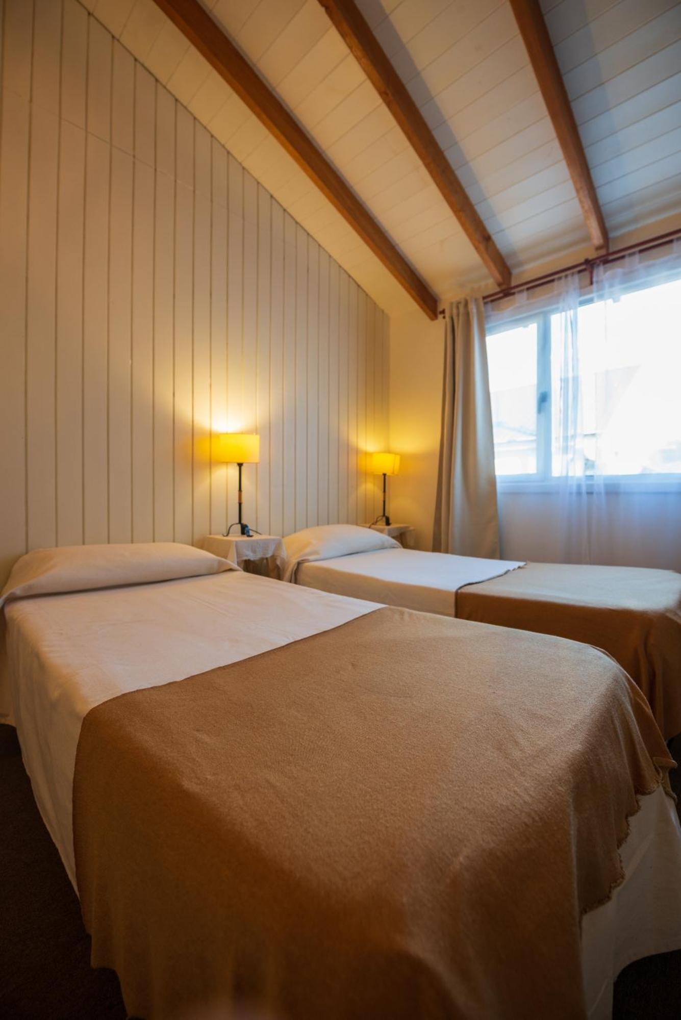 Los Calafates Hotel Ushuaia Bagian luar foto